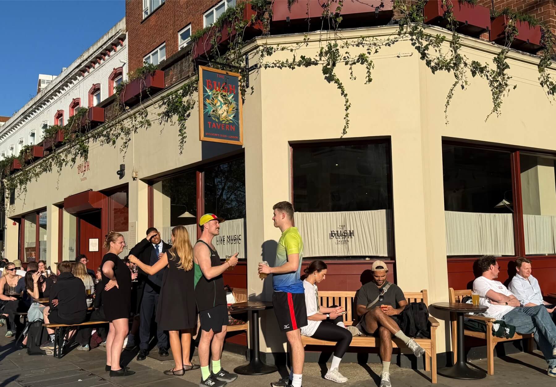 People drinking outside the venue