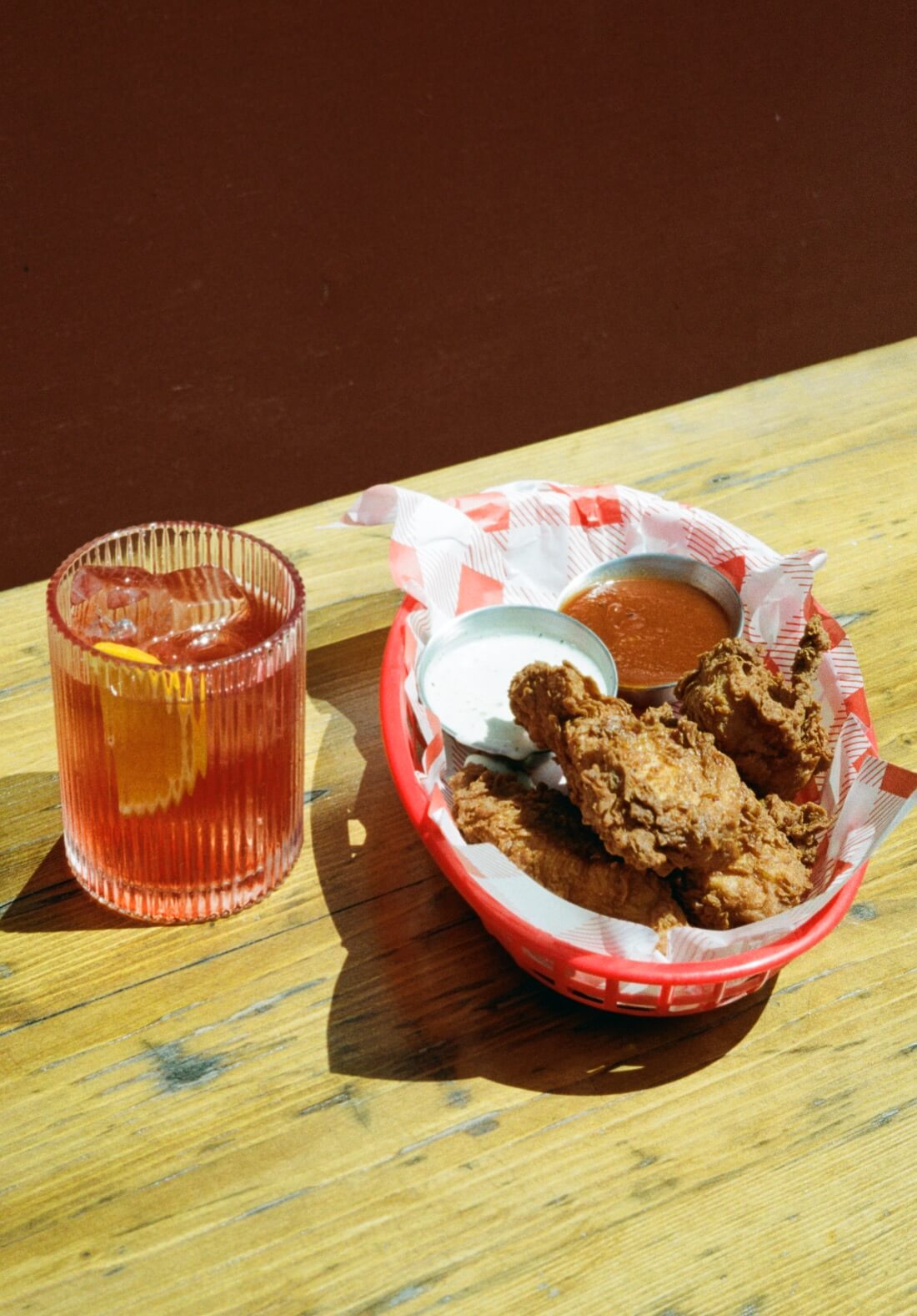 chicken tenders and a negroni 