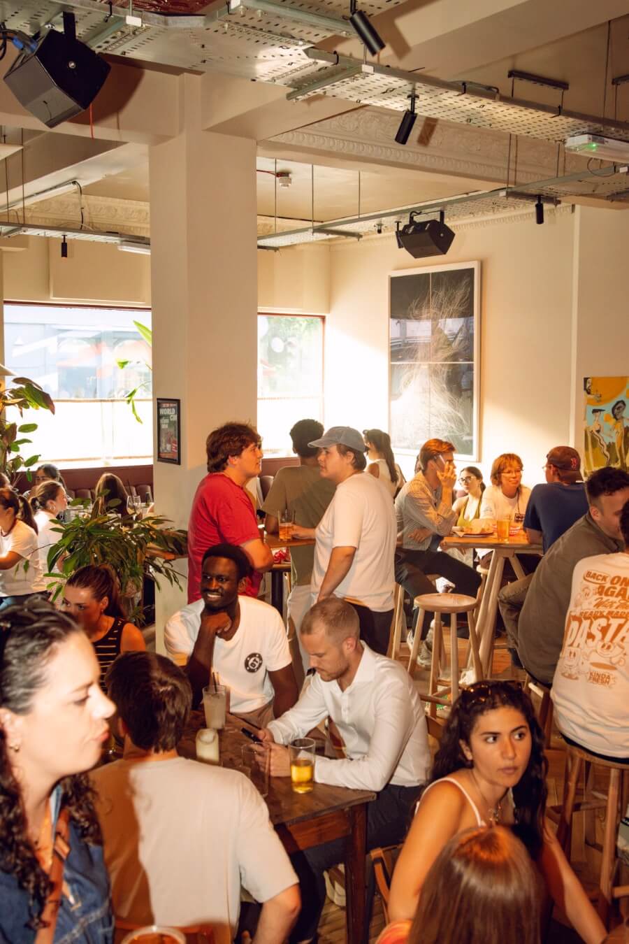 Guests sitting inside drinking cocktails